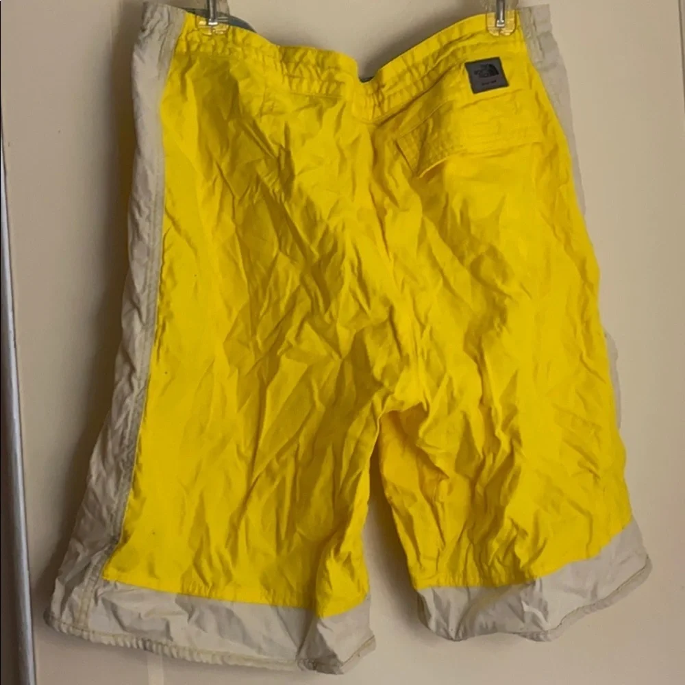 The north face men’s yellow swimming trunks